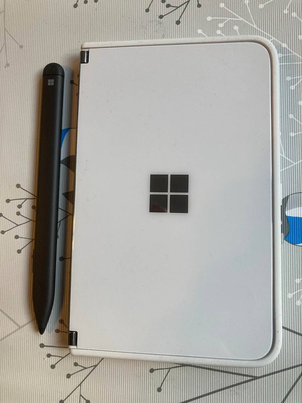 Surface Slim Pen next to Surface Duo